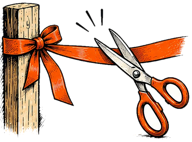 A ribbon stretched across a post with open scissors ready to cut