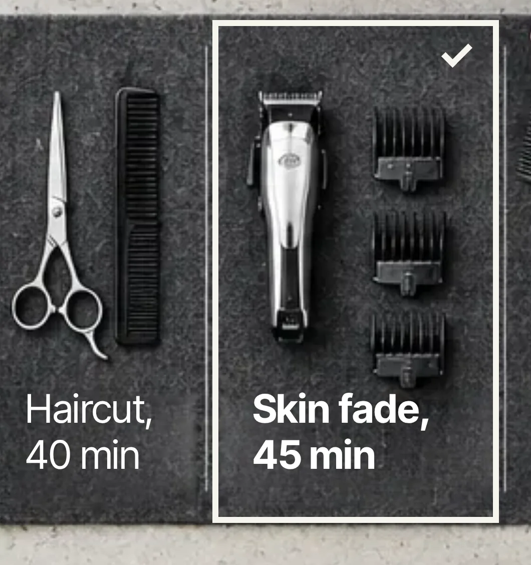 Overhead view of clippers, trimmer guards and a comb laid out on a black mat, with the Skin fade, 45 min tool highlighted.